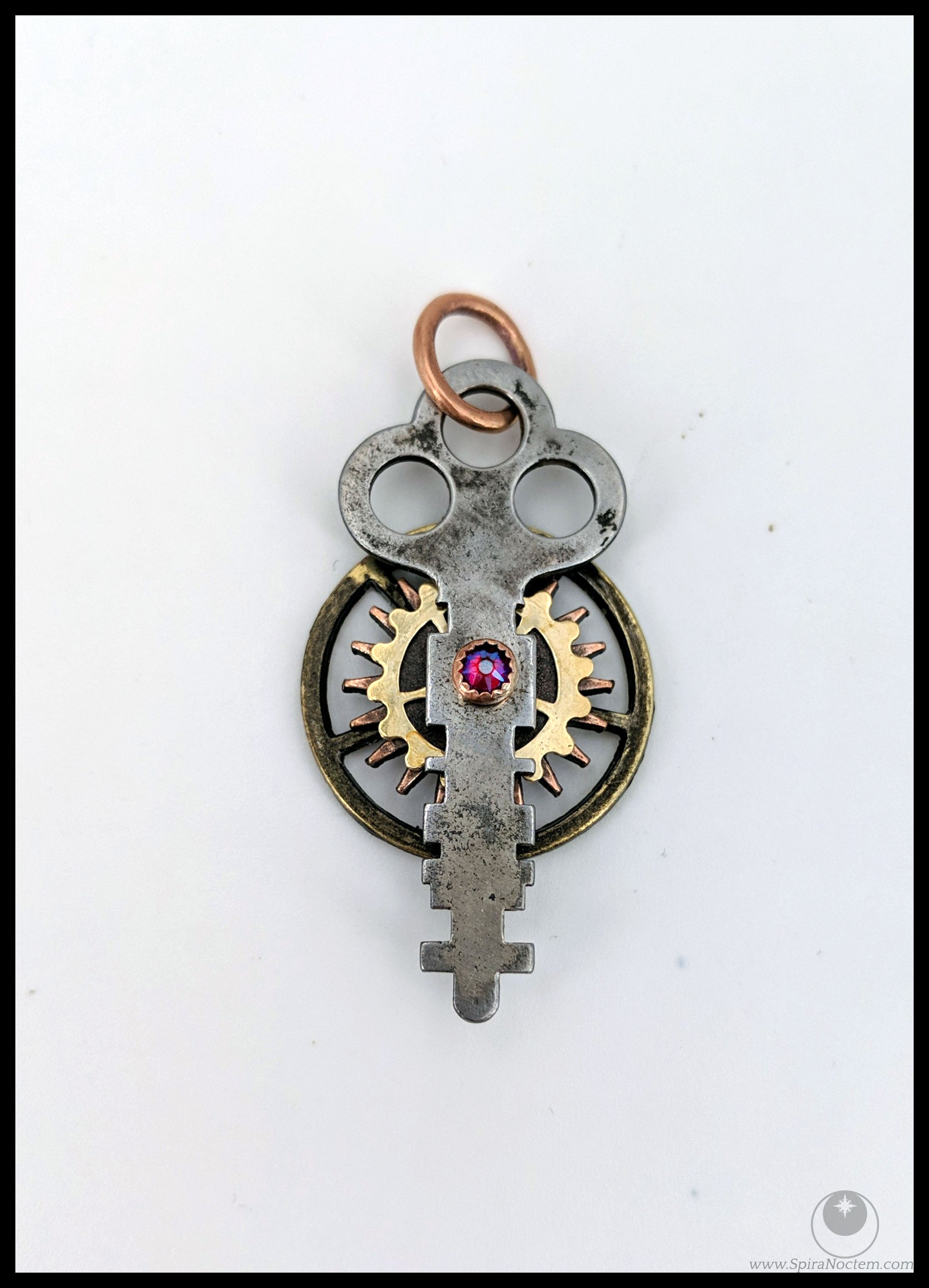 Spinning Key Pendant (Chain not included)